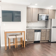 Flat screen tv over dinning table